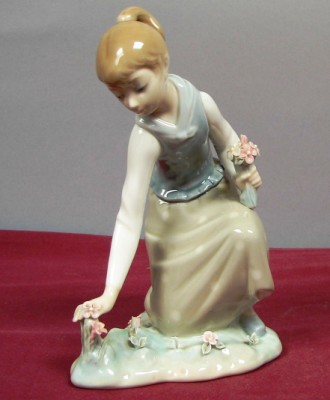 Appraisal: LLADRO - Girl Gathering Flowers - G Retired Good condition