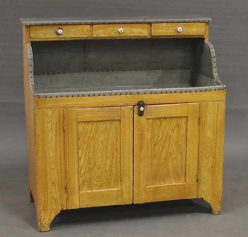 Appraisal: Top open shelf with drawers with porcelain pulls below zinc-lined