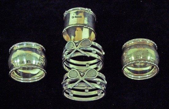 Appraisal: A pair of napkin rings with crossed tennis racquets motif