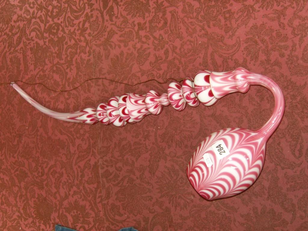 Appraisal: A large Nailsea glass pipe with pink and white streaked