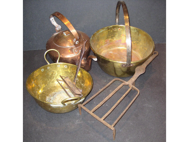 Appraisal: FIVE BRASS IRON AND COPPER POTS TRIVETS Estimate -