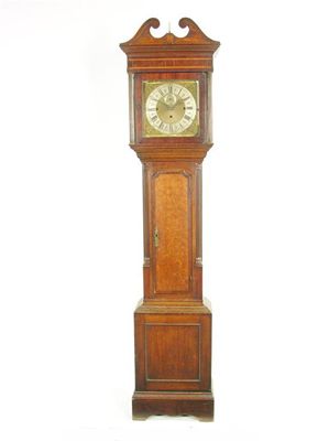 Appraisal: An oak and mahogany banded longcase clock the three train