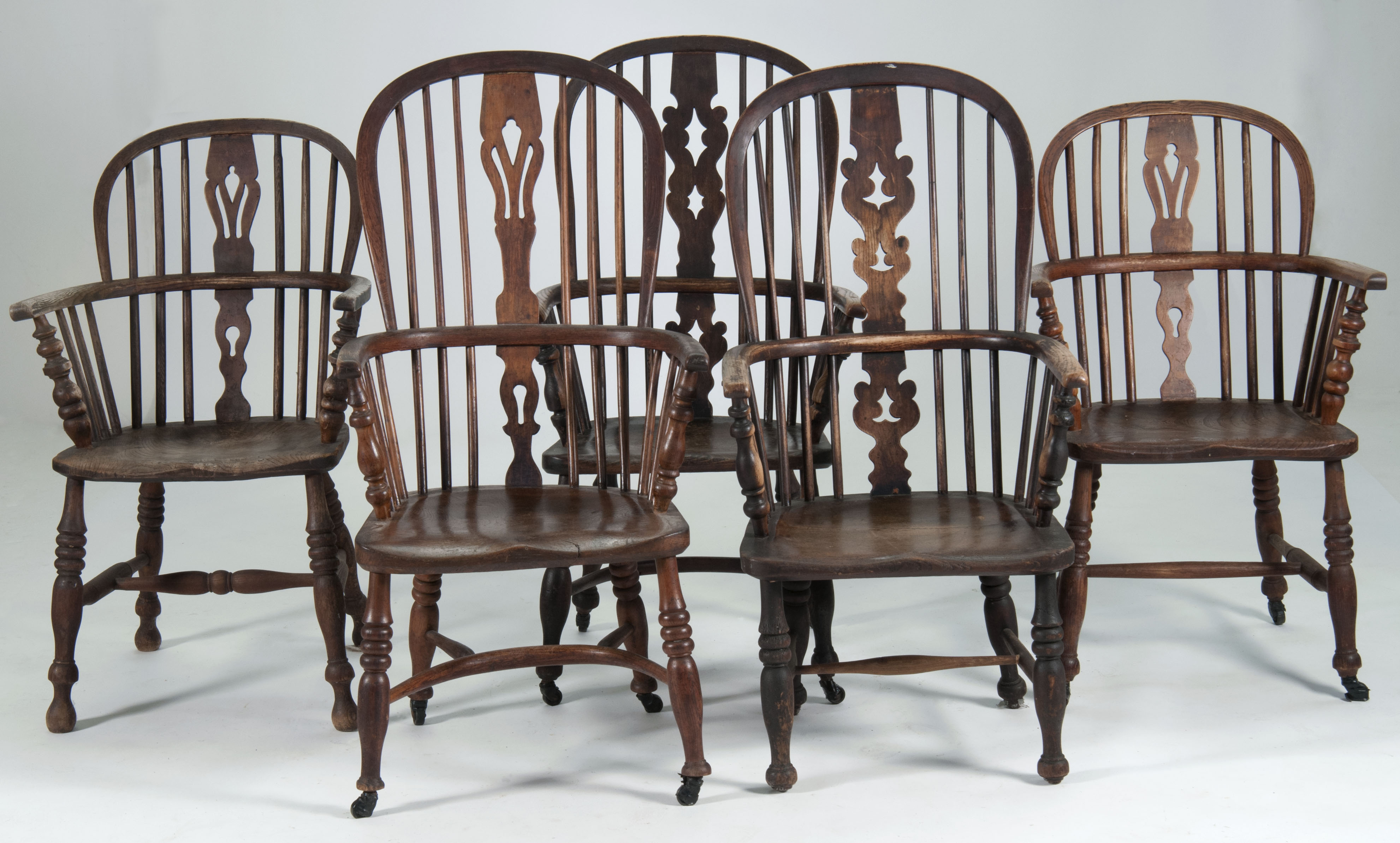 Appraisal: ASSEMBLED SET OF FIVE ENGLISH WINDSOR PUB CHAIRS th CenturyIn