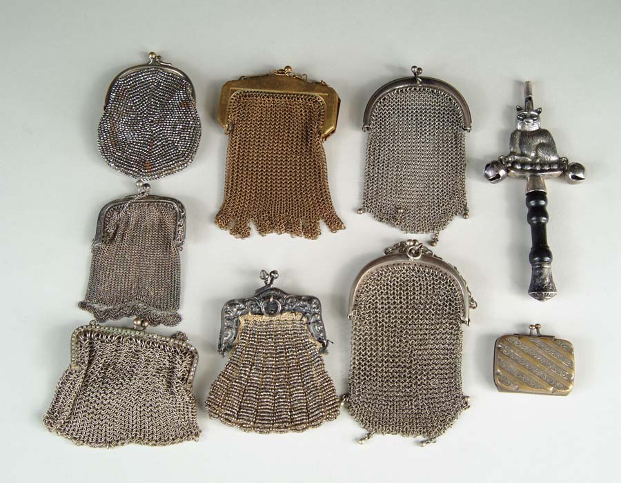 Appraisal: ASSORTMENT OF PURSES ALONG W CAT RATTLE This lot contains