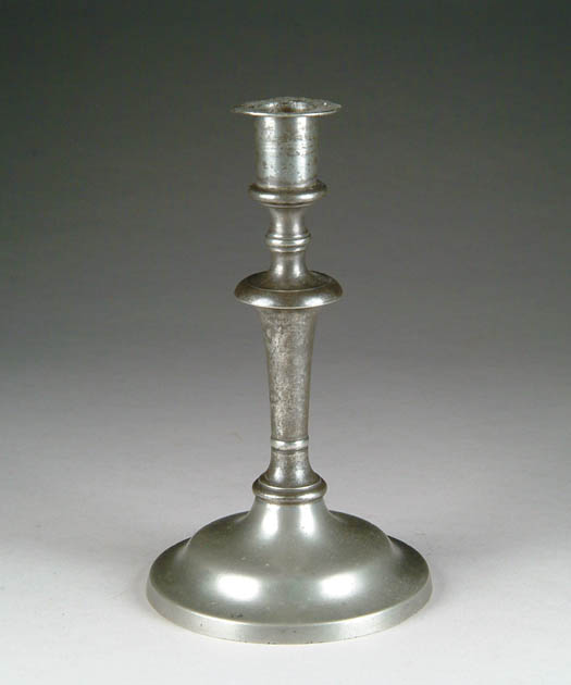 Appraisal: ANTIQUE PEWTER CANDLESTICK Marked on base Reed Barton Round base