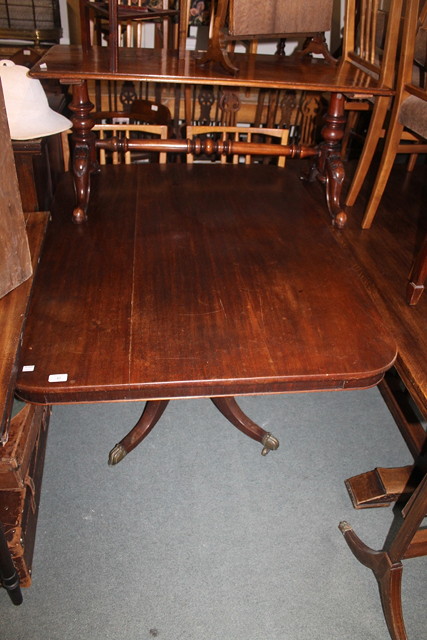 Appraisal: A VICTORIAN MAHOGANY BREAKFAST TABLE of tilt-top shaped quadruped base