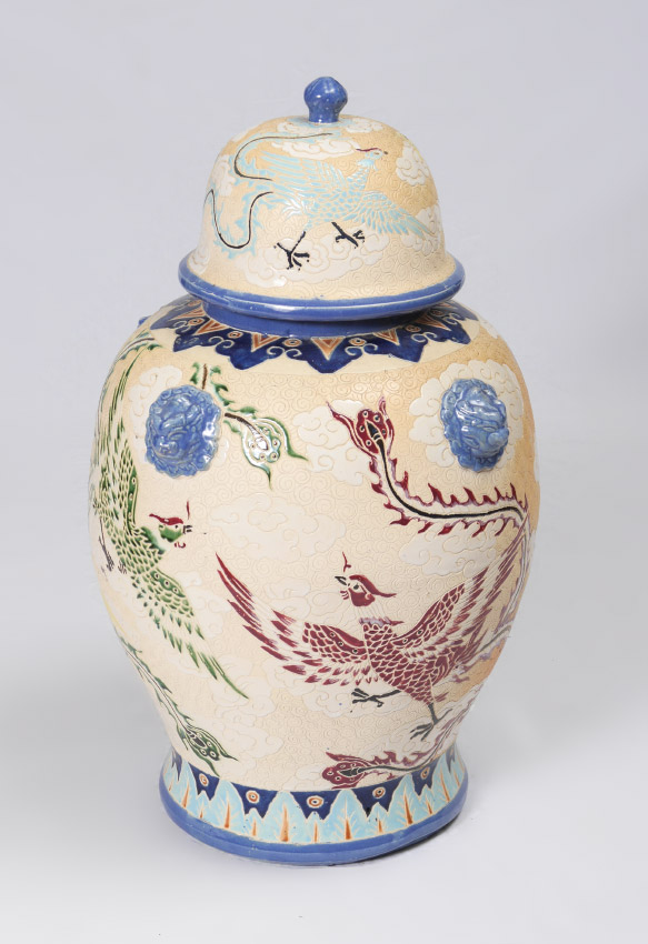 Appraisal: LARGE DECORATIVE COVERED TEMPLE JARS Incised polychrome birds in clouds