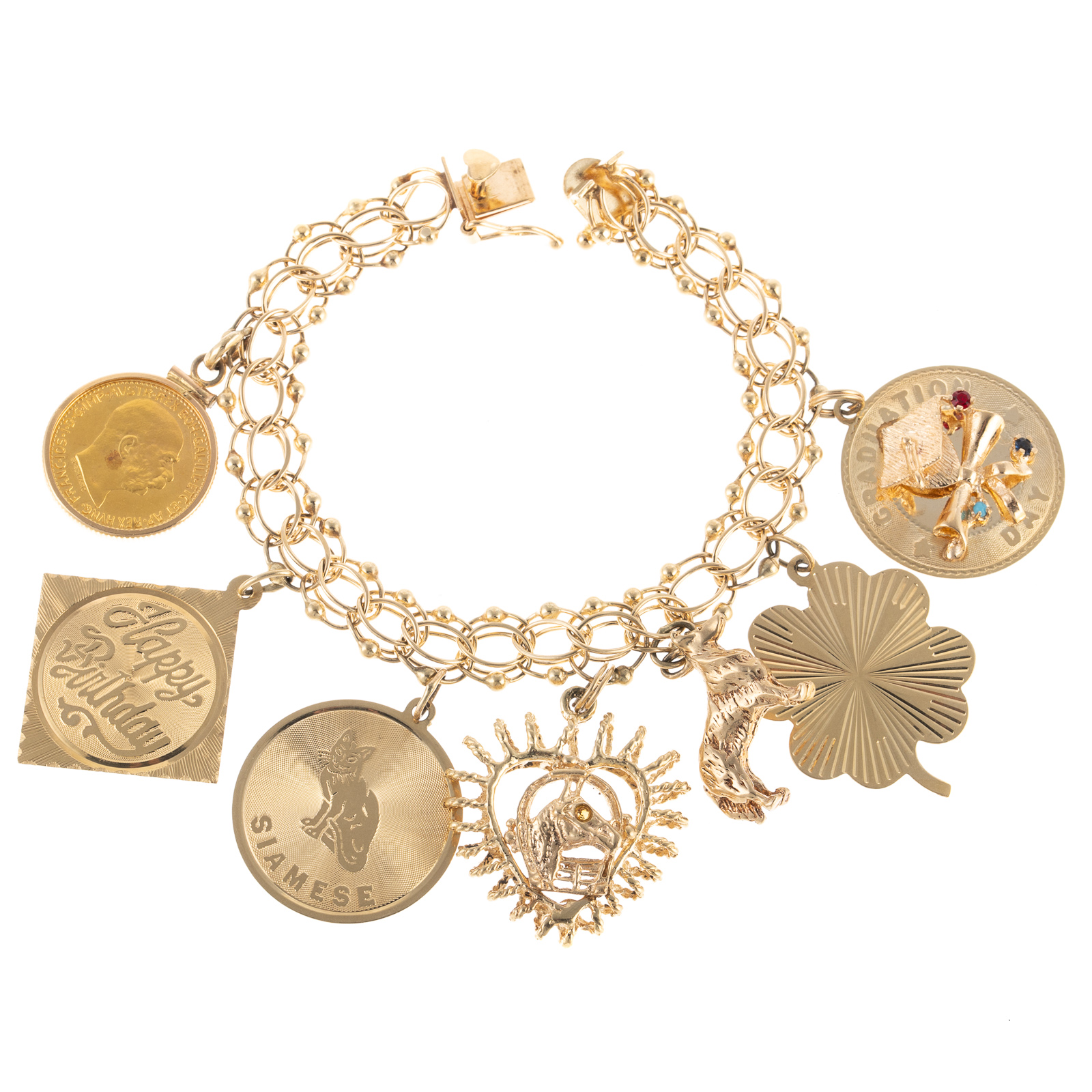 Appraisal: A VINTAGE CHARM BRACELET IN K K yellow gold open