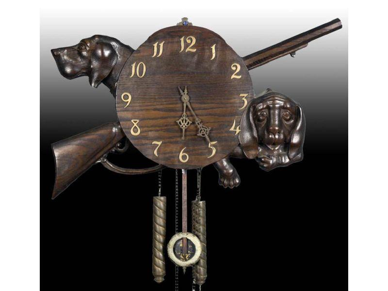 Appraisal: Black Forest Wall Clock with Dogs and Guns Description ''