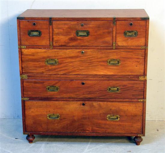 Appraisal: th century mahogany and brass bound secretaire military chest in