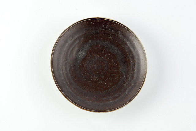 Appraisal: Lucie Rie - Dishmatt black glaze incised rimimpressed potter's seal