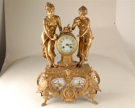 Appraisal: French Double Figure Clock porcelain inserts in base day time