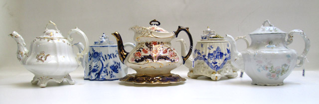 Appraisal: FIVE DECORATIVE TEA POTS in various patterns such as a