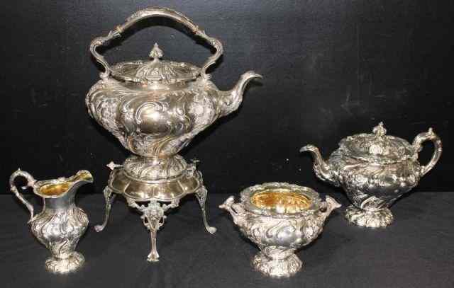 Appraisal: STERLING English Rococo Piece Set Beautiful quality Includes a kettle