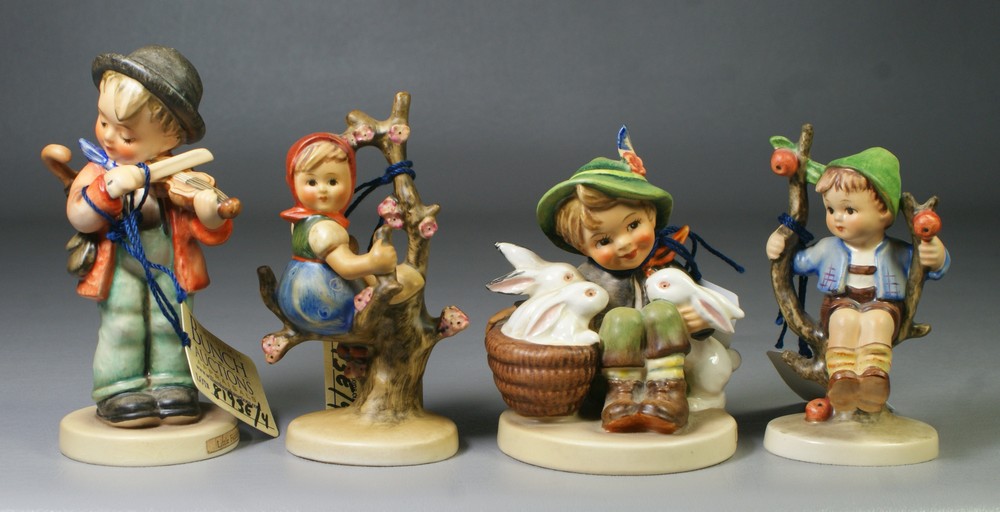 Appraisal: Hummel figurines Apple Tree Girl Hum very minor crazing Apple