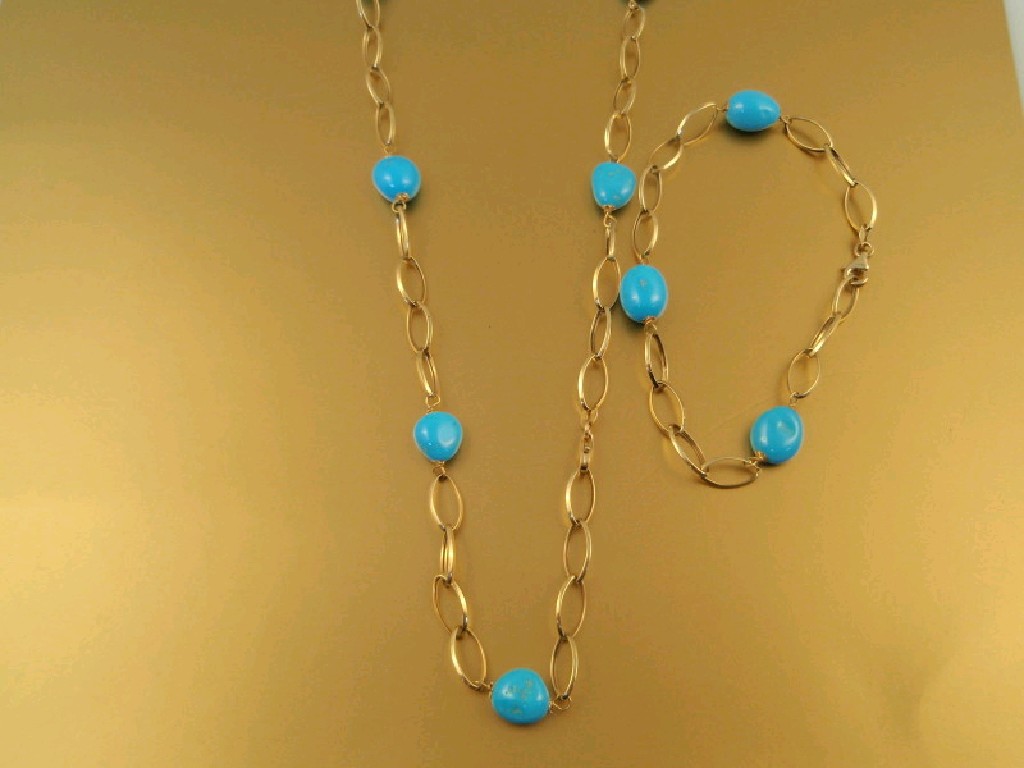 Appraisal: An open gold link and turquoise bead necklace and matching