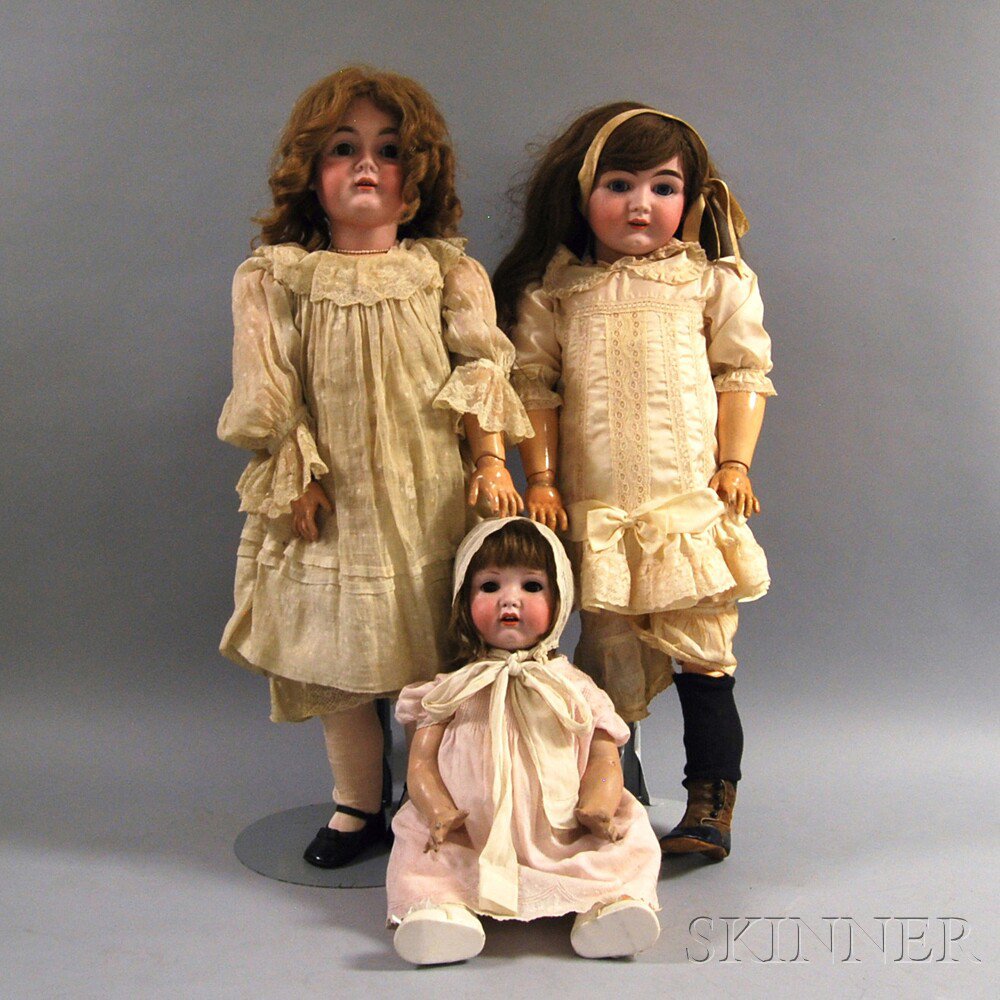 Appraisal: Three Large German Bisque Head Dolls a toddler girl head