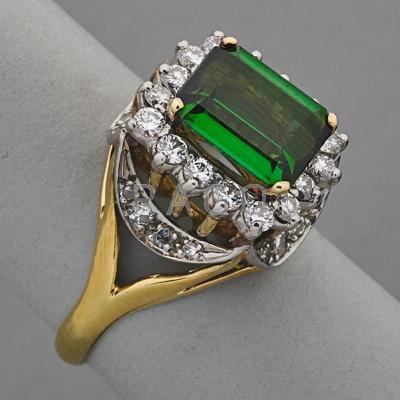 Appraisal: K GOLD TOURMALINE AND DIAMOND RING ca Emerald cut tourmaline