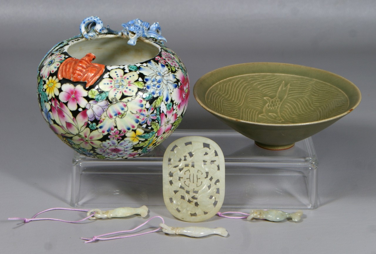 Appraisal: Carved Celadon bowl with fish decoration an Asian floral decorated