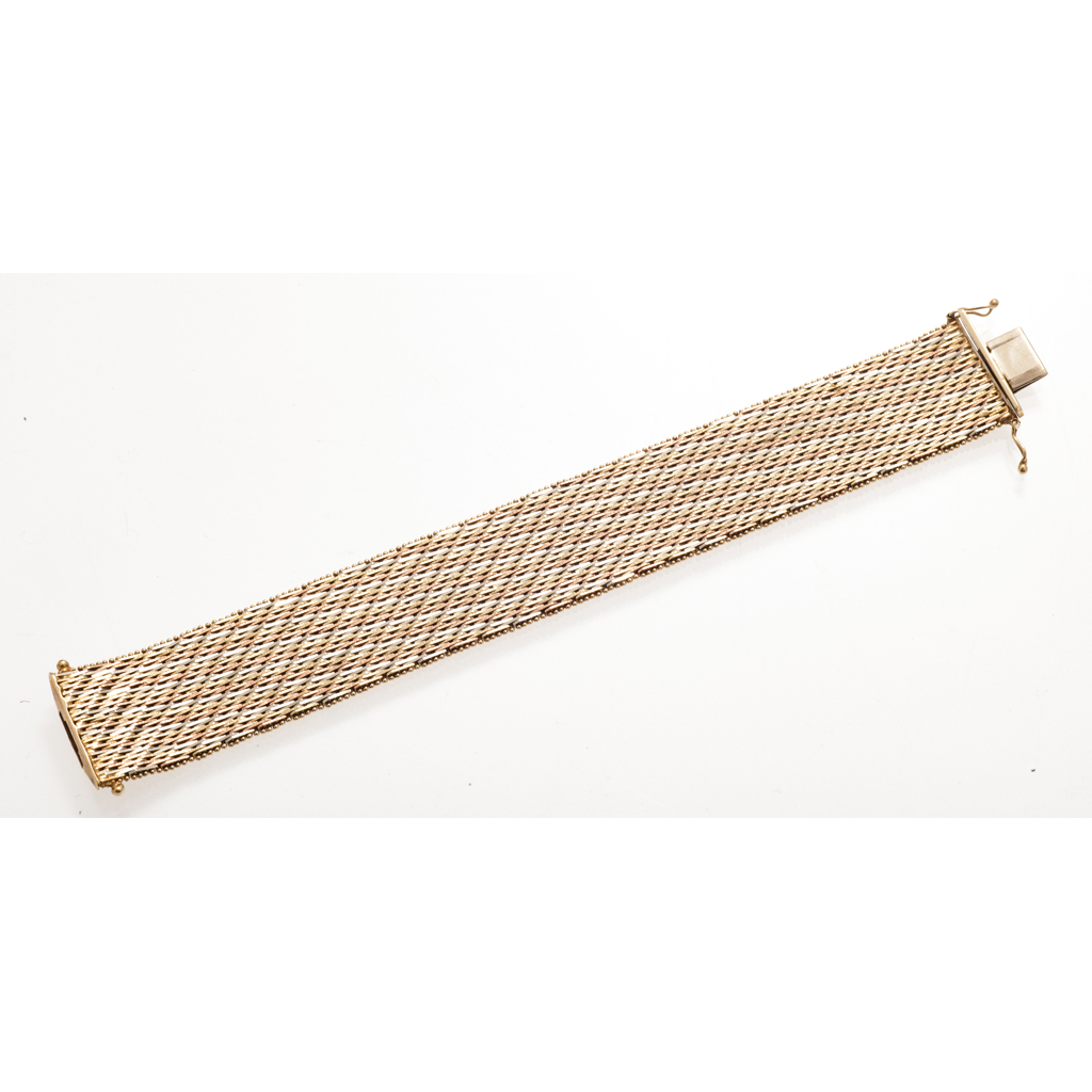 Appraisal: A modern woven link bracelet the broad band composed of