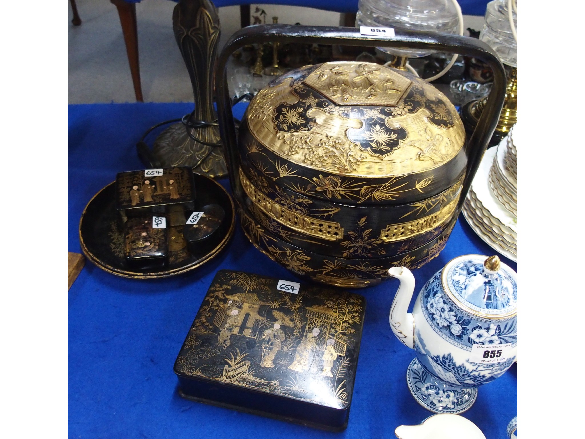 Appraisal: A Chinese lacquered gilt decorated tiffin basket two lacquered Chinoiserie