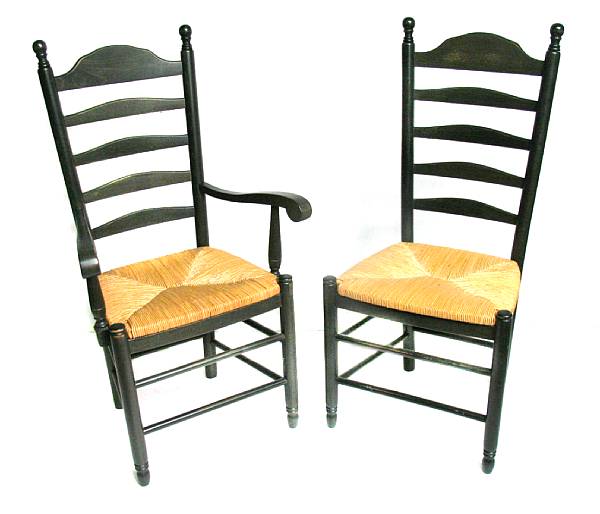 Appraisal: A set of five stained mixed wood ladderback dining chairs