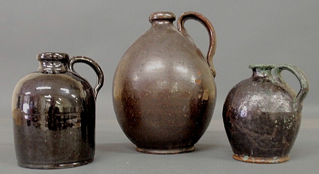 Appraisal: Three redware jugs th c h h h