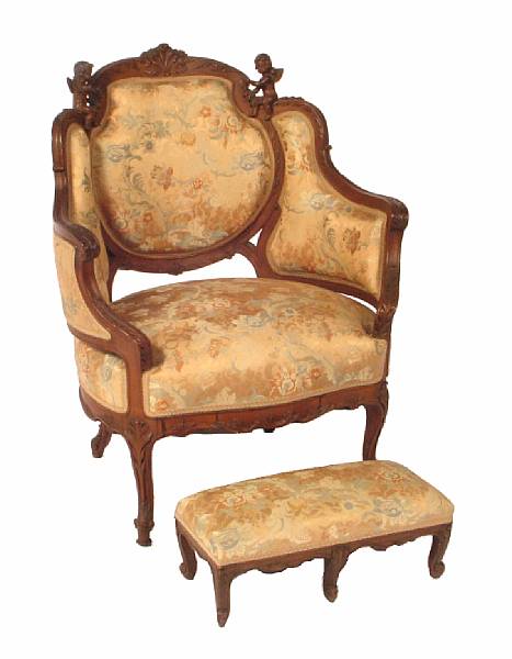 Appraisal: An Italian Rococo style armchair and matching footstool height of