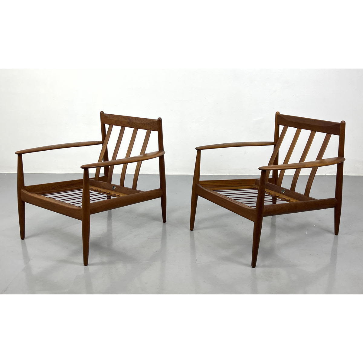 Appraisal: Pr GRETA JALK Danish Modern Teak Lounge Chairs Wide tapered