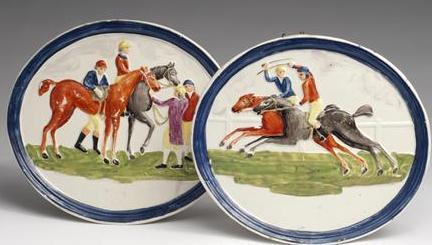 Appraisal: PAIR OF STAFFORDSHIRE PEARLWARE OVAL RACING PLAQUES - Each molded