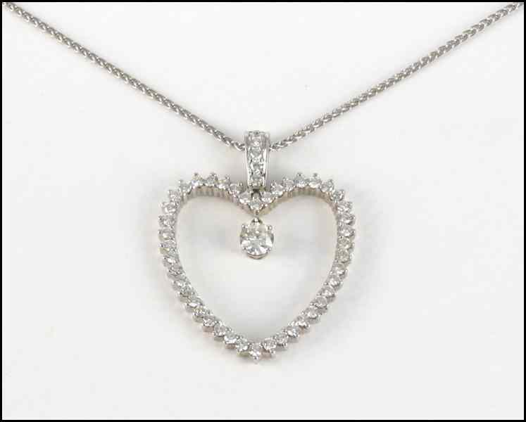 Appraisal: DIAMOND AND KARAT WHITE GOLD HEART PENDANT Together with an