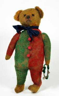 Appraisal: A Jester teddy bear straw filled covered in red green