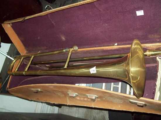 Appraisal: A BRASS TRUMPET IN A LEATHER CASE MAKER 'BOOSEY HAWKES