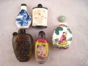 Appraisal: Five Chinese snuff bottles including one internally painted erotic example