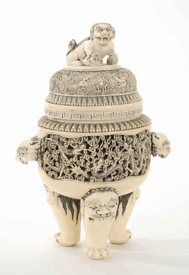 Appraisal: IVORY CARVED CHINESE COVERED JAR having side panels of dragon