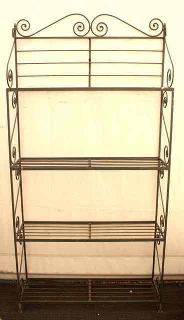 Appraisal: A FRENCH BOULANGERIE IRON BAGUETTE STAND four tier of open