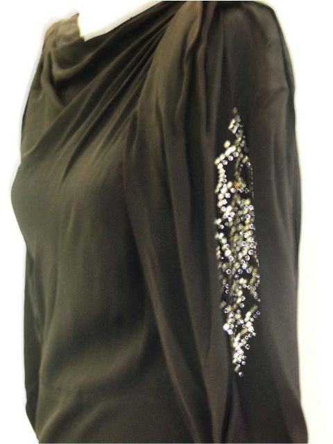 Appraisal: s dinner dress in black crepe with diamante accents to