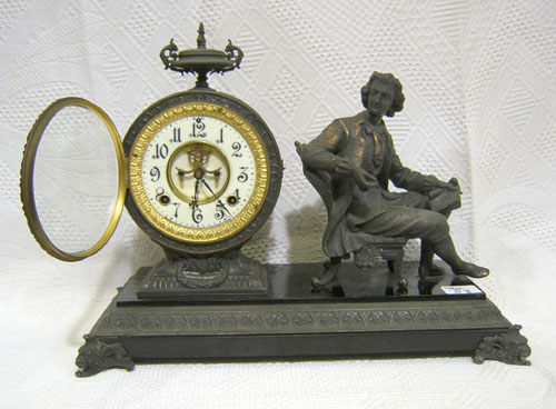 Appraisal: Ansonia white metal mantle clock with seated scholar h