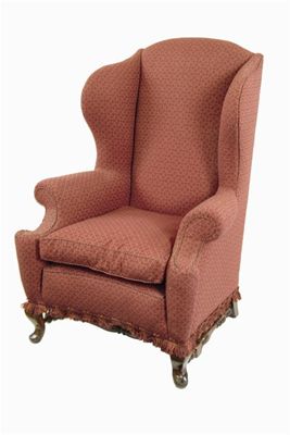 Appraisal: A Queen Anne style wing armchair on short walnut cabriole