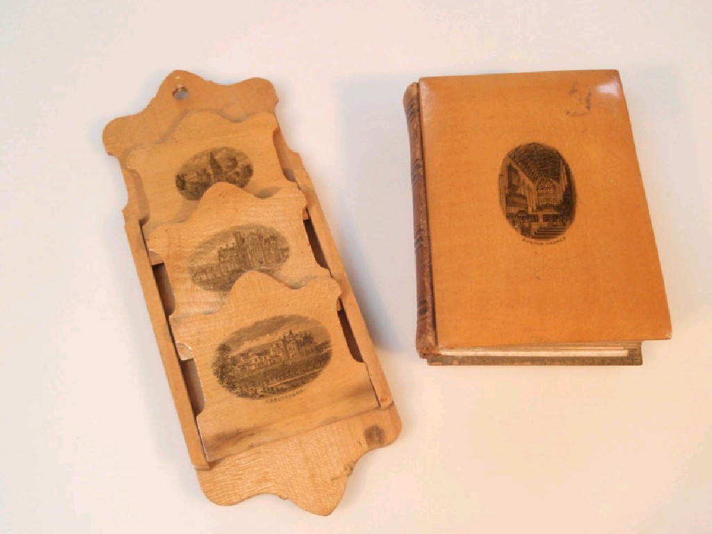 Appraisal: A Mauchline ware small photograph album the covers printed with