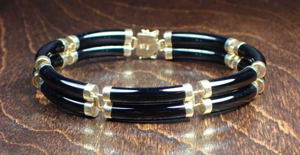 Appraisal: BLACK ONYX AND FOURTEEN KARAT GOLD BRACELET The - bracelet