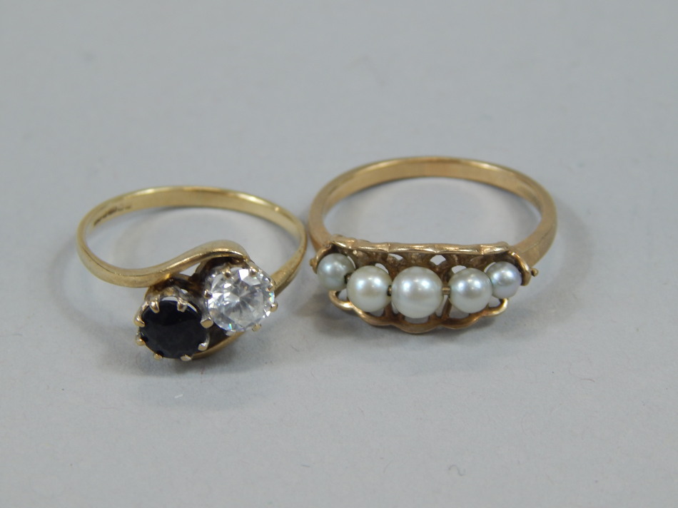 Appraisal: Two ladies dress rings comprising an example set with five