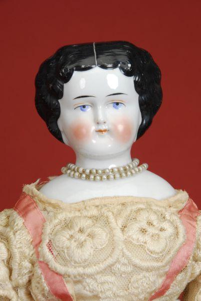 Appraisal: China Lady Doll Germany ca glazed porcelain shoulder head painted