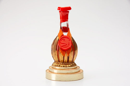 Appraisal: SCHIAPARELLI Si perfume bottle in enameled and gilded glass with