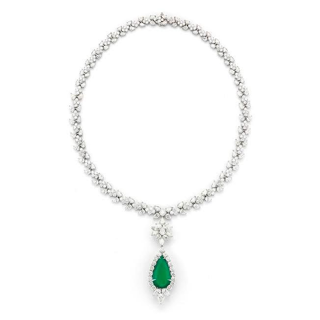 Appraisal: EMERALD AND DIAMOND NECKLACE EMERALD AND DIAMOND NECKLACEA dramatic emerald