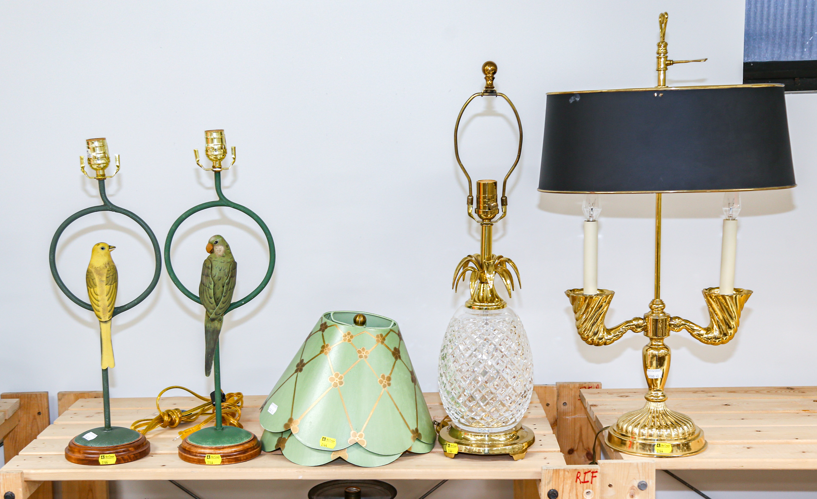 Appraisal: FOUR TABLE LAMPS Including two metal parrot lamps with shades