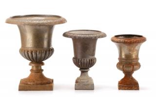 Appraisal: Collection of Cast Iron Gadrooned Garden Urns A collection of