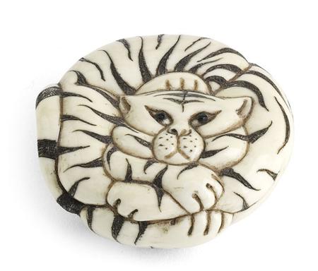 Appraisal: A Japanese stained ivory netsuke of a tiger Meiji period