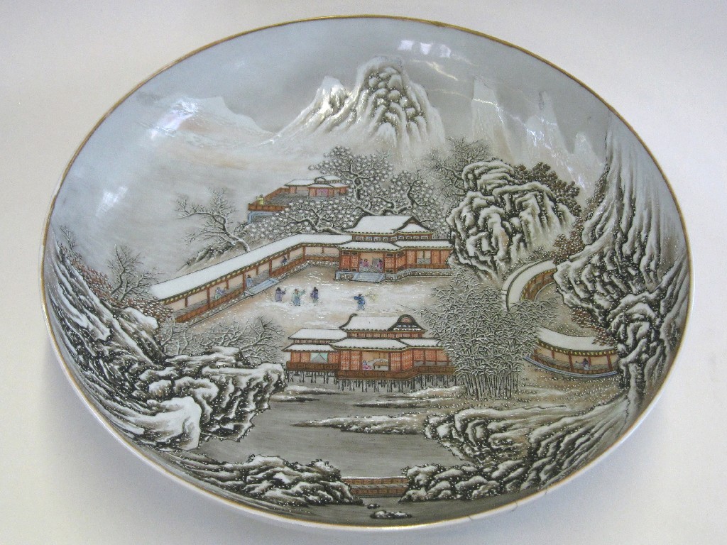 Appraisal: Japanese charger bowl decorated with a wintry mountainous scene some