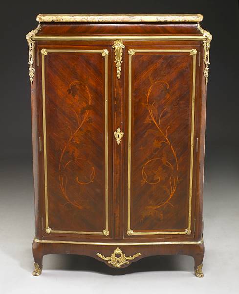 Appraisal: A Louis XV style gilt bronze mounted marquetry inlaid kingwood